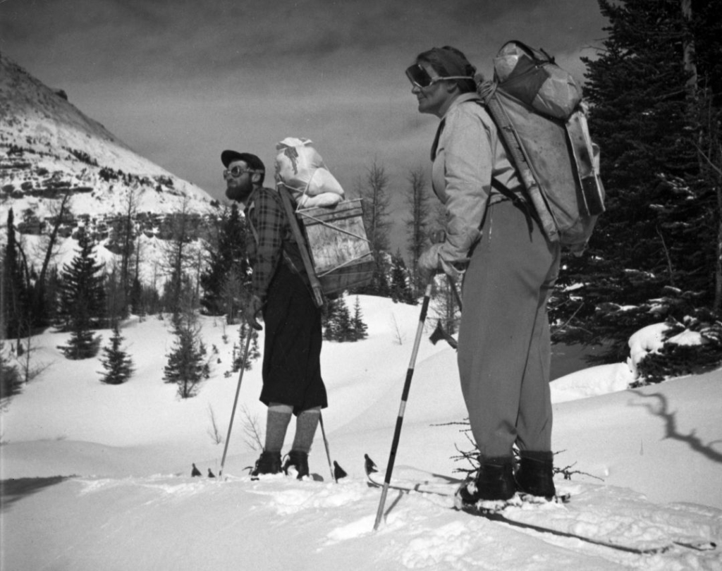 Lizzie Rummel and Ken Jones looking out across the mountains in winter.