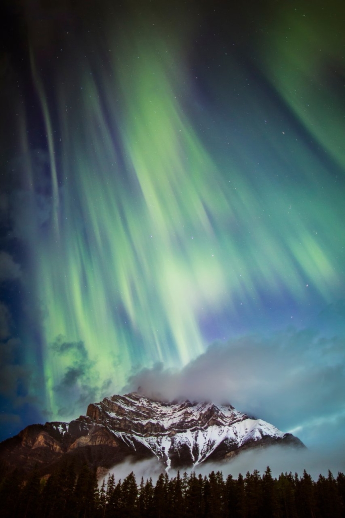 Northern lights over Cascade mountain near the Icefields Parkway